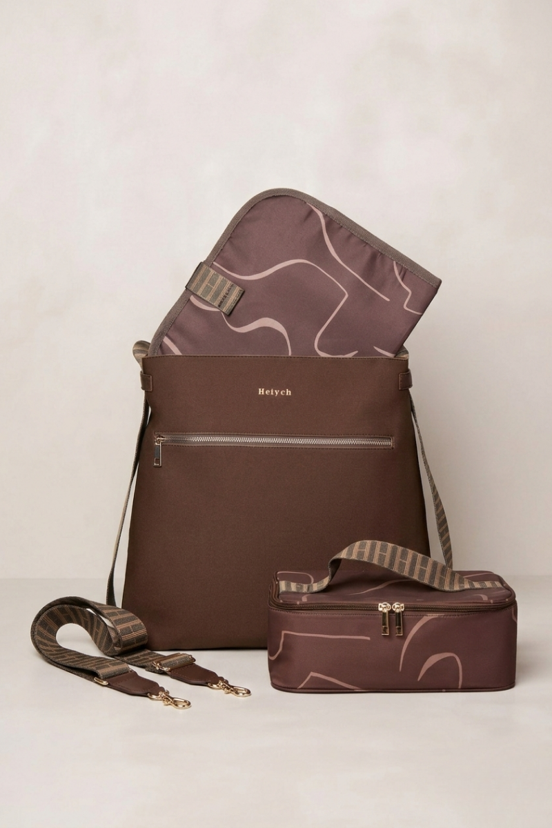 Chocolate Brown bag with matching pouch and strap on a light beige background