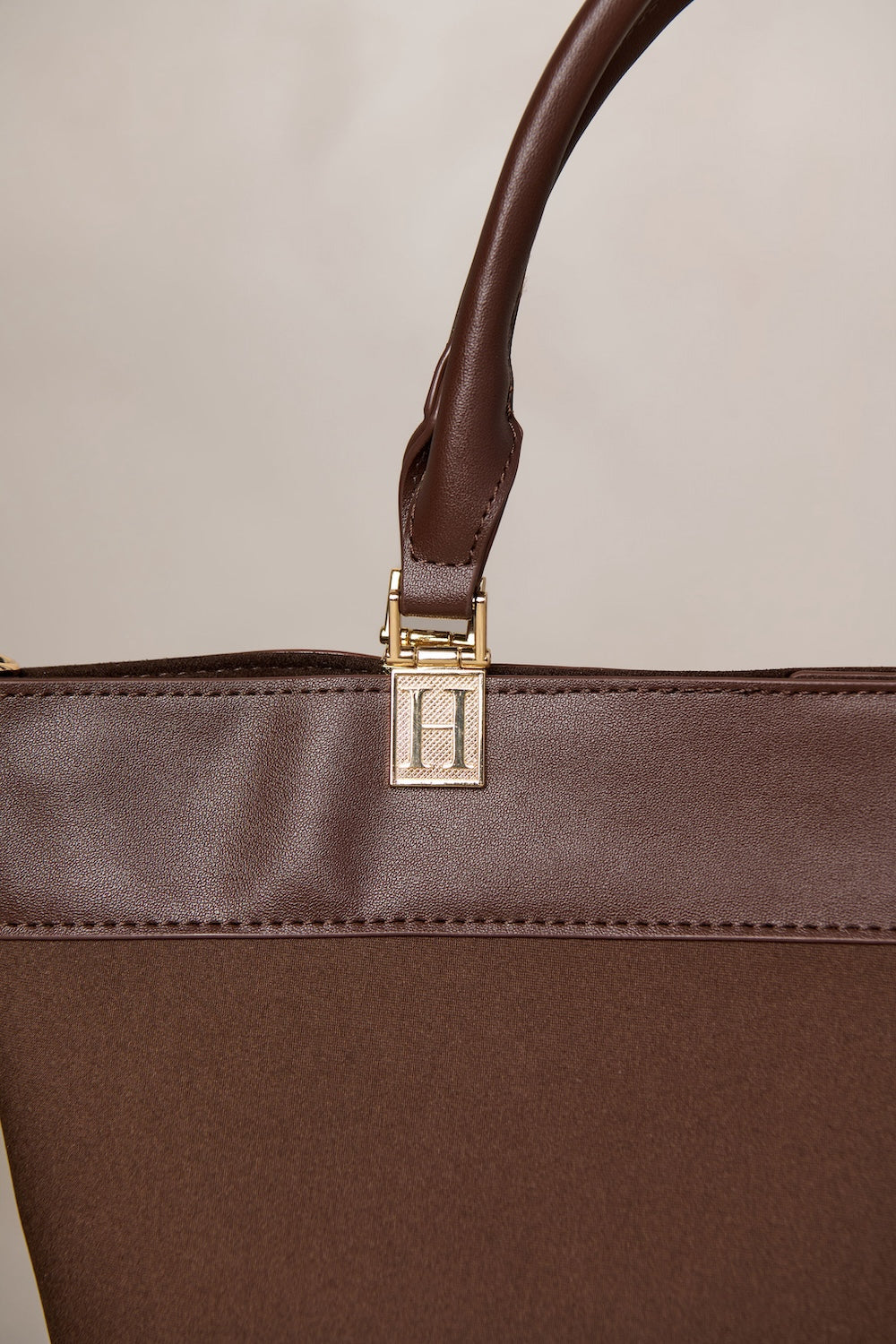 Chocolate brown bag with gold hardware