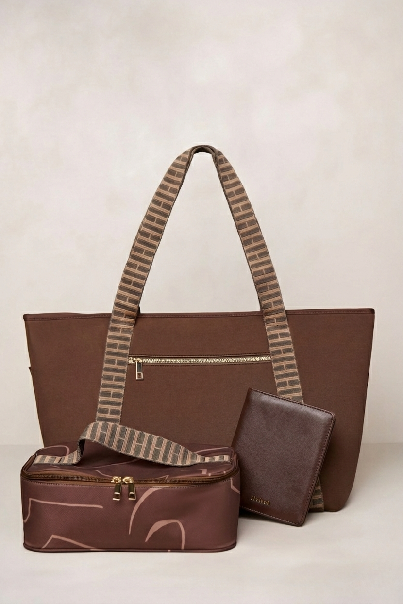 Chocolate brown tote bag with matching pouch on a beige background