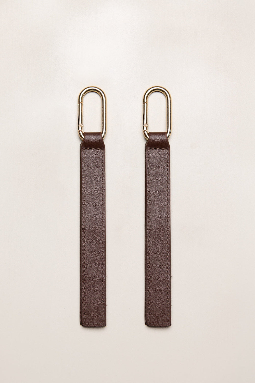 Chocolate Heiych H-Pram Straps for attaching bags to a pram