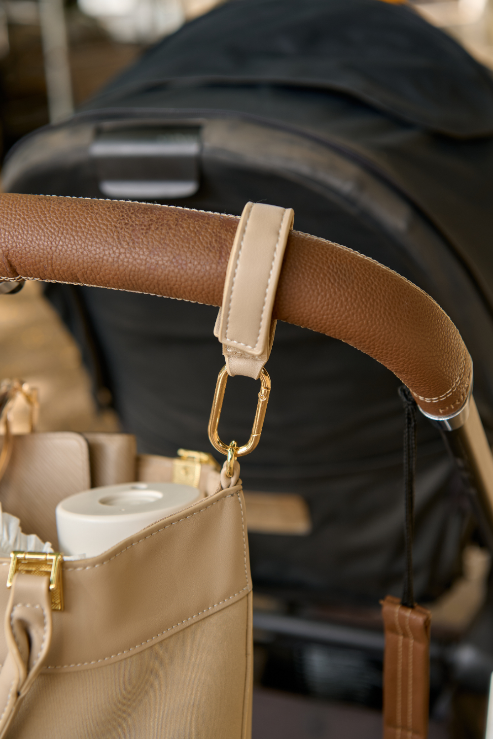 Taupe Heiych H-Pram Straps for attaching bags to a pram