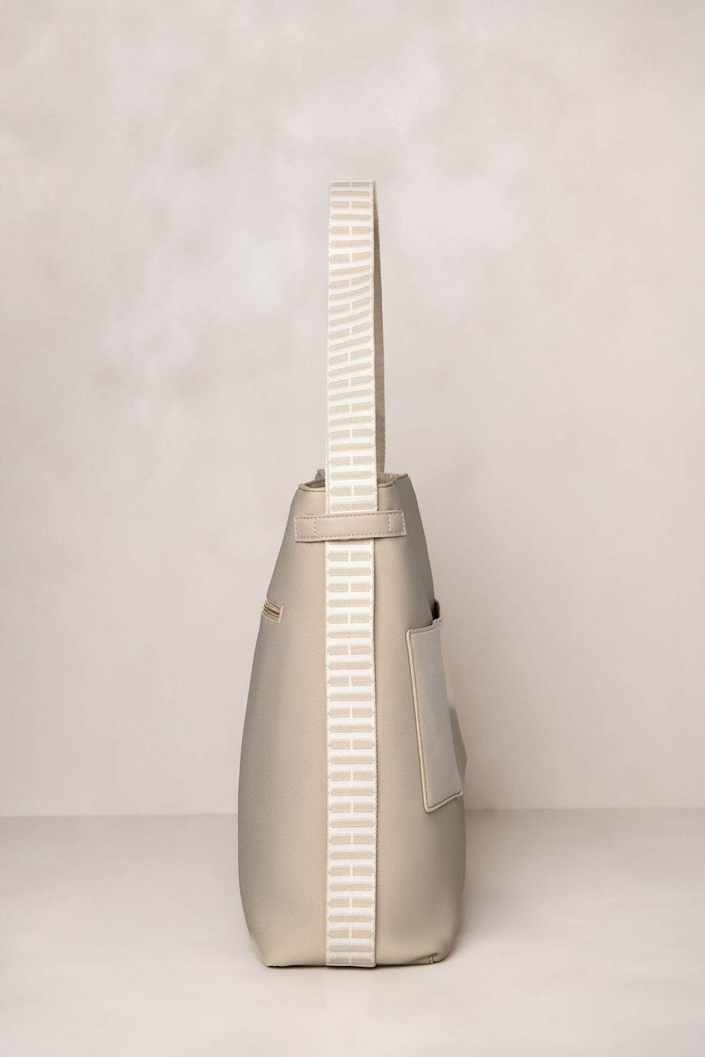 Taupe cream convertible tote backpack bag in neoprene with gold hardware convertible straps