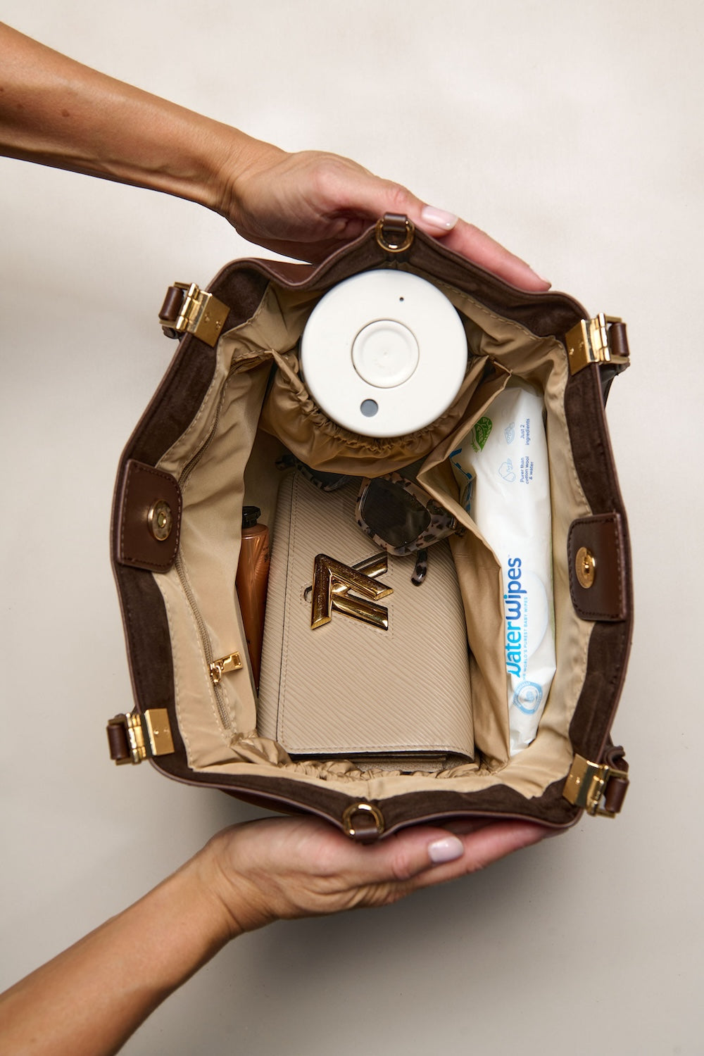 Chocolate brown bag with items inside